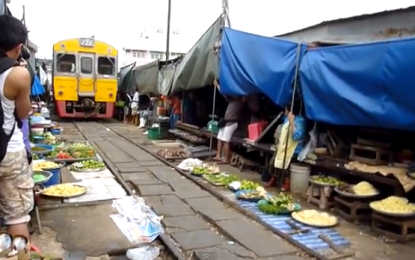 Amazing railway market at meaklong in thailand