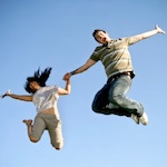 2 people jumping for joy
