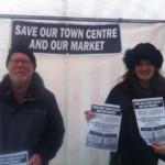 Ken Barry and Victoria Harvey pictured by their stall at Market Cross in Leighton town centre.