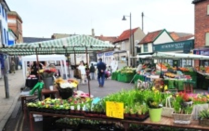 Cars to mix with market stalls