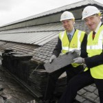 LOOKING UP Cllrs Nick Peel and John Byrne on the roof of the market to see refurbishment work progress.