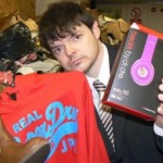 Simon Cripwell of Warwickshire Trading Standards with just a small fraction of the haul of counterfeit products.