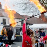 Circus Show in Crowle Market Place - pictured is Rebecca Henderson of Party Workshop, as part of their fire display.
