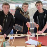 Carpentry and joinery level one students from Keighley Campus Leeds City College, from left, Jonny Hardaker, Christopher Hainsworth and Jake Smithurst, demonstrate how to make wooden garden planters and bird boxes 